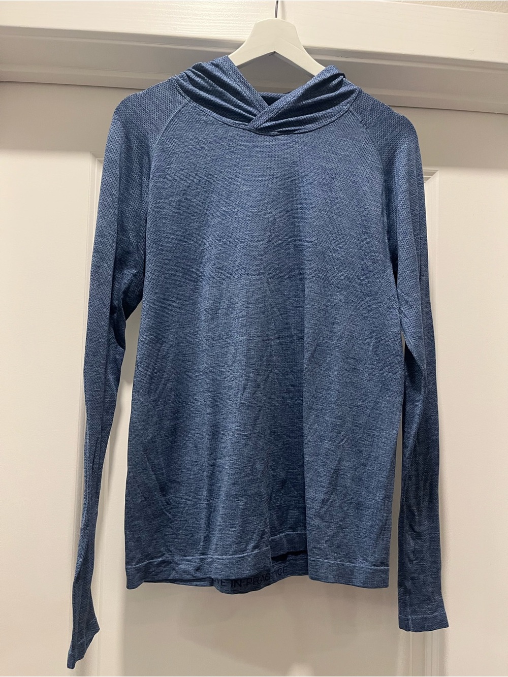 LuluLemon Men’s athletic hooded long-sleeve shirt size small.